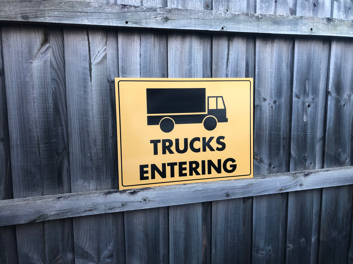 Trucks Entering Image Sign