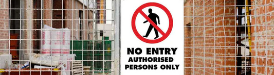Worksite fence displaying No Entry Authorised Persons Only Prohibition Sign