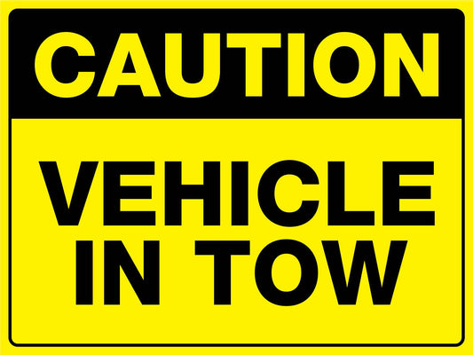 Caution Vehicle In Tow Sign