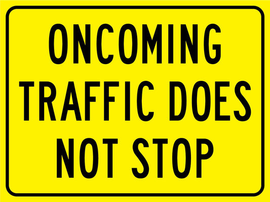 Oncoming Traffic Does Not Stop Sign