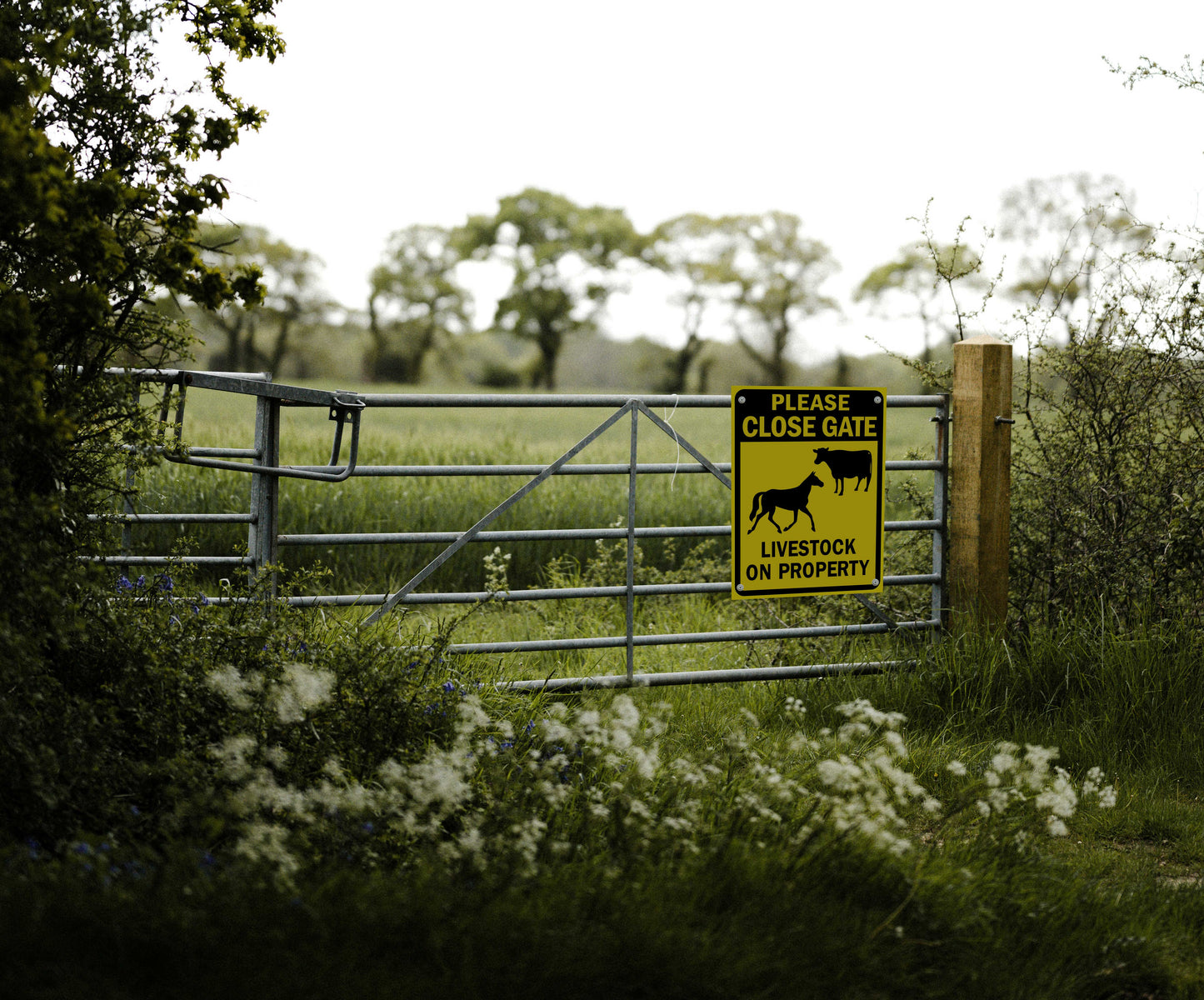 Please Close Gate Livestock on Property Symbol Sign