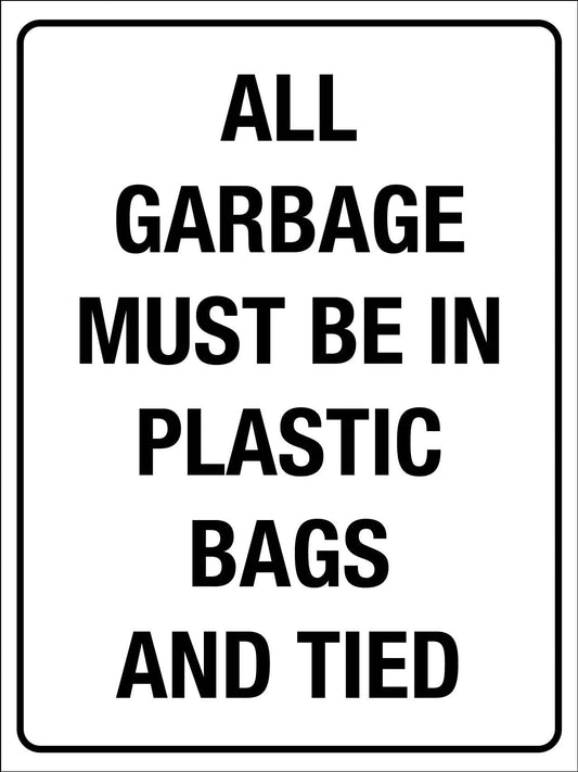 All Garbage Must Be In Plastic Bags And Tied Sign