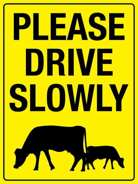 Please Drive Slowly Cows Sign