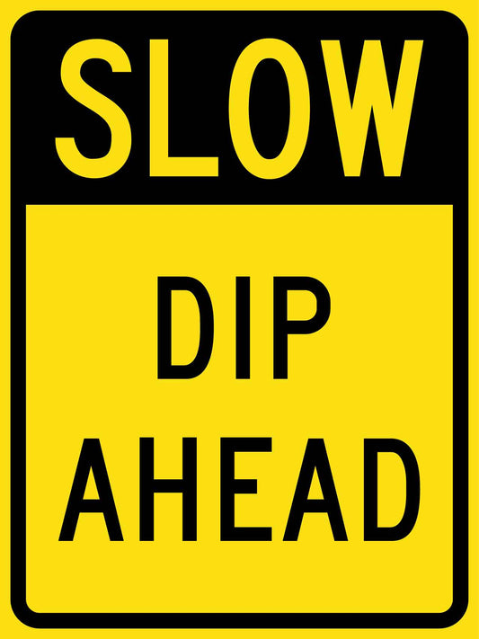 Slow Dip Ahead Sign