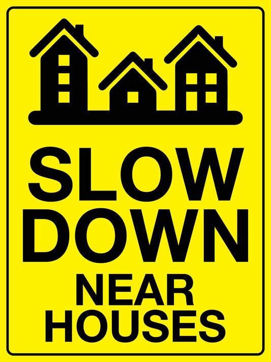Slow Down Near Houses Sign